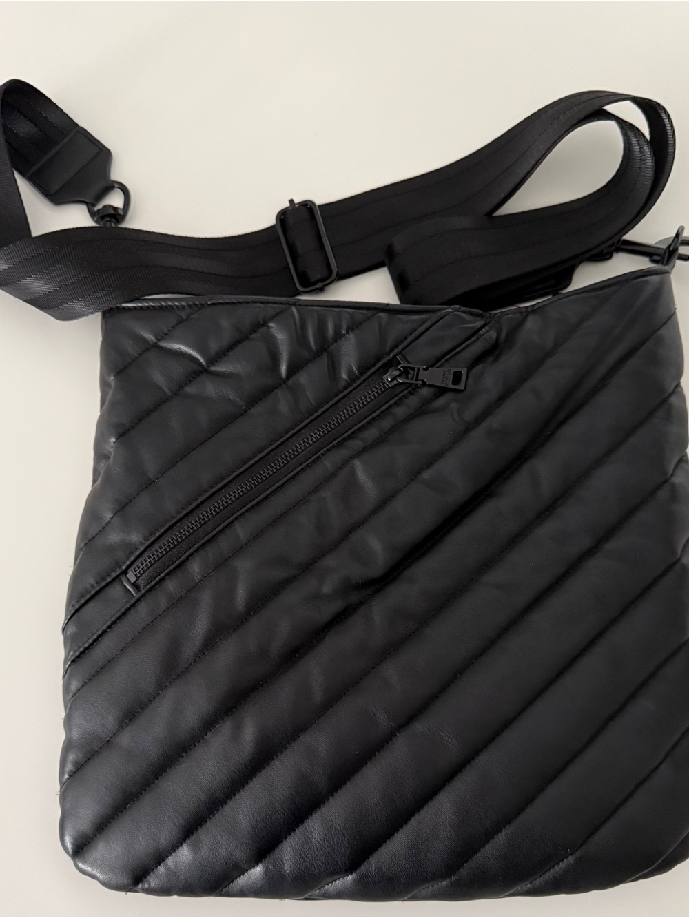 THINK ROYLN Black Quilted Diagonal-Zip Crossbody Bag